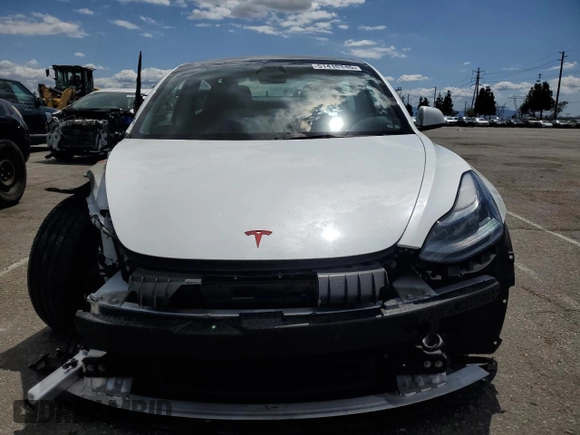 2022 Tesla Model 3 Long Range with VIN 5YJ3E1EB4NF139023, listed as a Copart auction lot 51410345 with 54,789 mi miles and Salvage Title. Bid and sale history available at DreamBid. Image 5.