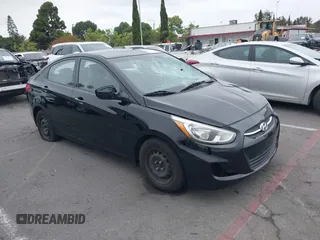 2015 Hyundai Accent GLS z VIN KMHCT4AE8FU827019, wystawiony jako IAAI lot #42179517 z przebiegiem 52 039 mil mil oraz . Historia ofert i sprzedaży dostępna na DreamBid. Obrazek 1.