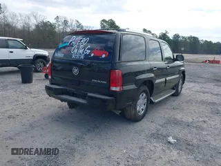2003 Cadillac Escalade с VIN 1GYEC63T03R170763, выставлен на аукционе IAAI как лот 41651319 с пробегом 470 161 миль миль и . История ставок и продаж доступна на DreamBid. Изображение 4.