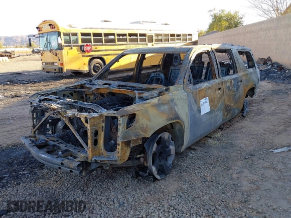 2019 Chevrolet Suburban LT with VIN 1GNSCHKC2KR395939, listed as a IAAI auction lot 41407596 with Not Provided miles and . Bid and sale history available at DreamBid. Image 16.