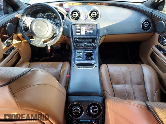 2013 Jaguar XJ с VIN SAJWA1C74D8V41339, выставлен на аукционе Copart как лот 46274345 с пробегом 135 993 миль миль и Чистый • Clean title. История ставок и продаж доступна на DreamBid. Изображение 8.
