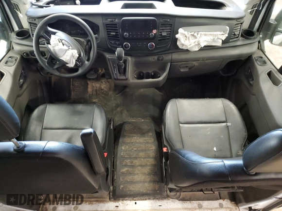 2023 Ford Transit Cargo z VIN 1FTBR1X89PKB01620, wystawiony jako Copart lot #42648755 z przebiegiem Nie podano mil oraz Nie do naprawy • Non repairable. Historia ofert i sprzedaży dostępna na DreamBid. Obrazek 8.