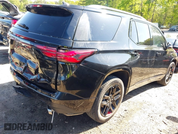 2023 Chevrolet Traverse Premier with VIN 1GNERKKW5PJ128805, listed as a IAAI auction lot 42032622 with 36,463 mi miles and . Bid and sale history available at DreamBid. Image 4.