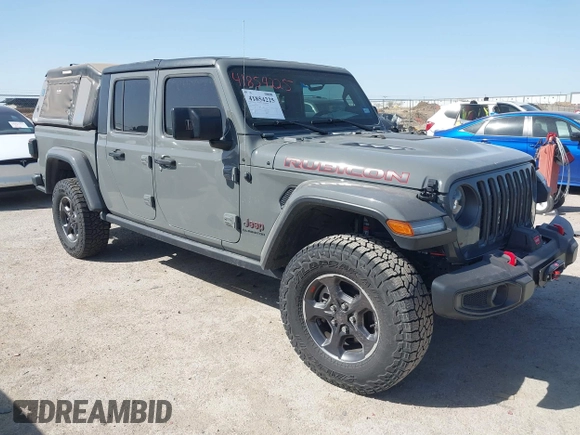 2022 Jeep Gladiator Rubicon z VIN 1C6JJTBG2NL167034, wystawiony jako IAAI lot #41854225 z przebiegiem Nie podano mil oraz . Historia ofert i sprzedaży dostępna na DreamBid. Obrazek 1.