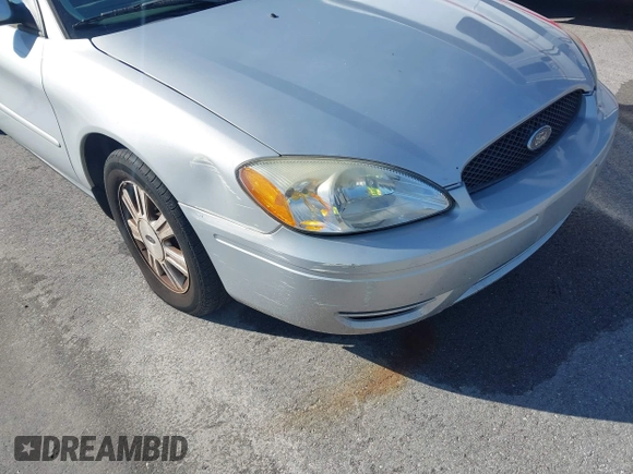 2006 Ford Taurus z VIN 1FAHP56U56A216490, wystawiony jako IAAI lot #41142565 z przebiegiem 189 796 mil mil oraz . Historia ofert i sprzedaży dostępna na DreamBid. Obrazek 6.