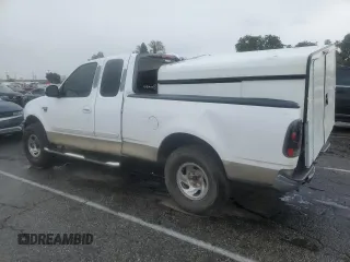 2002 Ford F-150 XL with VIN 1FTRX17LX2KB25894, listed as a Copart auction lot 49283405 with 247,998 mi miles and Salvage title. Bid and sale history available at DreamBid. Image 2.