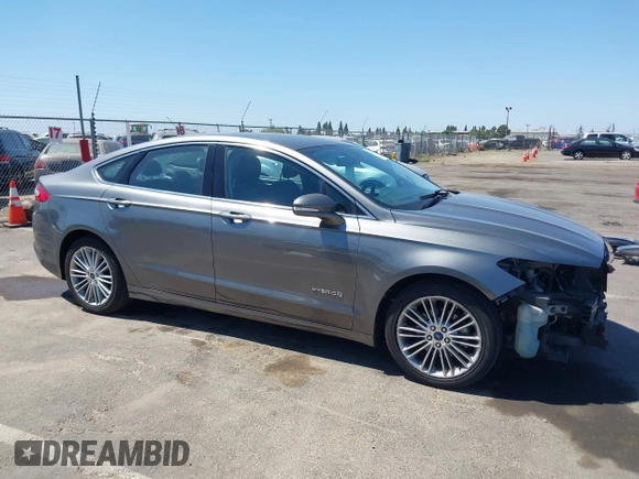 2014 Ford Fusion SE Hybrid with VIN 3FA6P0LU5ER393530, listed as a IAAI auction lot 42478440 with 93,728 mi miles and . Bid and sale history available at DreamBid. Image 14.