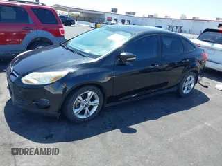 2013 Ford Focus SE with VIN 1FADP3F21DL264359, listed as a IAAI auction lot 42562576 with 167,624 mi miles and . Bid and sale history available at DreamBid. Image 12.