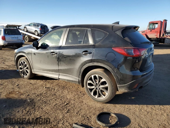 2016 Mazda CX-5 Grand Touring with VIN JM3KE4DY0G0731384, listed as a Copart auction lot 44741695 with 58,727 mi miles and Salvage Title. Bid and sale history available at carsss.com. Image 2.