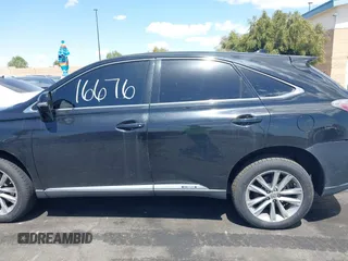 2015 Lexus RX 450h with VIN 2T2ZB1BA0FC001351, listed as a IAAI auction lot 41916676 with Not Provided miles and . Bid and sale history available at DreamBid. Image 14.
