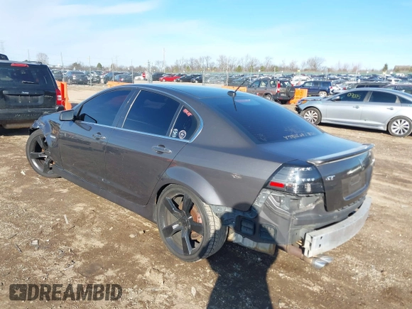 2009 Pontiac G8 GT with VIN 6G2EC57YX9L221534, listed as a IAAI auction lot 41227662 with 130,941 mi miles. Bid and sale history available at carsss.com. Image 3.
