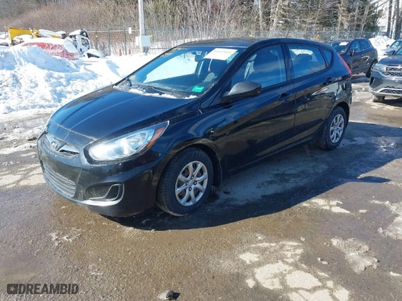 2013 Hyundai Accent GS with VIN KMHCT5AE9DU082462, listed as a IAAI auction lot 41642444 with 160,000 mi miles. Bid and sale history available at carsss.com. Image 2.