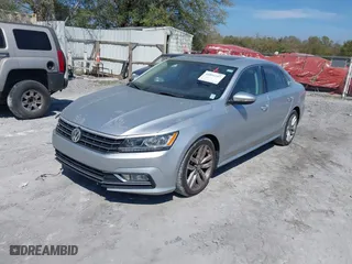2017 Volkswagen Passat 1.8T SE w/Technology with VIN 1VWGT7A3XHC025096, listed as a IAAI auction lot 41891297 with 124,375 mi miles. Bid and sale history available at carsss.com. Image 17.