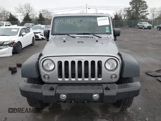 2015 Jeep Wrangler Sport with VIN 1C4AJWAG6FL501160, listed as a IAAI auction lot 41941661 with 134,842 mi miles. Bid and sale history available at carsss.com. Image 12.