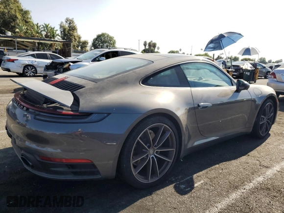 2024 Porsche 911 Carrera with VIN WP0AA2A9XRS207622, listed as a Copart auction lot 68636984 with 5,813 mi miles and Salvage Title. Bid and sale history available at carsss.com. Image 3.