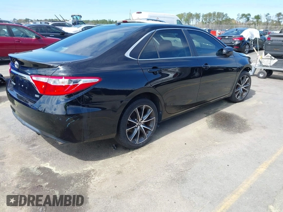 2015 Toyota Camry XLE with VIN 4T1BF1FK0FU908290, listed as a IAAI auction lot 41806103 with 135,533 mi miles and . Bid and sale history available at DreamBid. Image 4.