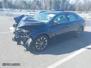 2016 Toyota Avalon Hybrid XLE Premium with VIN 4T1BD1EB2GU052127, listed as a IAAI auction lot 41737260 with 266,841 mi miles. Bid and sale history available at carsss.com. Image 18.