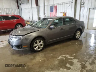 2012 Ford Fusion SE z VIN 3FAHP0HA6CR163998, wystawiony jako Copart lot #57440965 z przebiegiem 175 960 mil mil oraz Nie do naprawy. Historia ofert i sprzedaży dostępna na DreamBid. Obrazek 1.