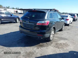 2010 Mazda CX-9 Touring with VIN JM3TB2MA2A0200201, listed as a IAAI auction lot 41631321 with 264,210 mi miles and . Bid and sale history available at DreamBid. Image 4.