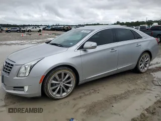 2013 Cadillac XTS Luxury с VIN 2G61R5S36D9227710, выставлен на аукционе Copart как лот 53826965 с пробегом 61 408 миль миль и Списание • Salvage title. История ставок и продаж доступна на DreamBid. Изображение 1.