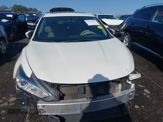 2016 Nissan Altima S z VIN 1N4AL3APXGC202447, wystawiony jako IAAI lot #41923452 z przebiegiem 167 800 mil mil oraz . Historia ofert i sprzedaży dostępna na DreamBid. Obrazek 13.
