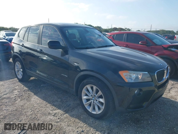 2013 BMW X3 xDrive28i with VIN 5UXWX9C57D0A13160, listed as a IAAI auction lot 42001594 with 140,630 mi miles. Bid and sale history available at carsss.com. Image 1.
