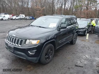 2014 Jeep Grand Cherokee Laredo with VIN 1C4RJFAG7EC119978, listed as a IAAI auction lot 41161797 with 140,823 mi miles. Bid and sale history available at carsss.com. Image 17.
