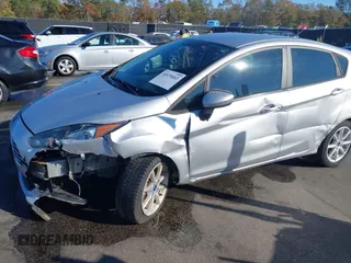 2019 Ford Fiesta SE with VIN 3FADP4EJ0KM107058, listed as a IAAI auction lot 40979683 with 116,854 mi miles. Bid and sale history available at carsss.com. Image 6.