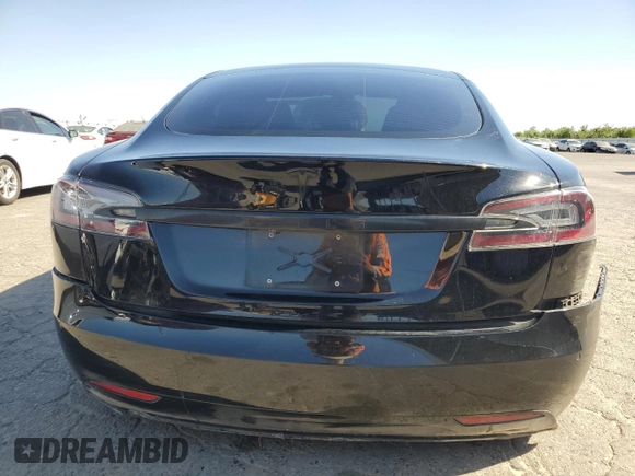 2018 Tesla Model S 75D с VIN 5YJSA1E27JF271596, выставлен на аукционе Copart как лот 57681565 с пробегом 106 710 миль миль и Списание • Salvage title. История ставок и продаж доступна на DreamBid. Изображение 6.