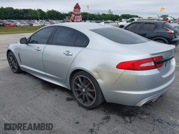 2015 Jaguar XF V6 Portfolio with VIN SAJWA0F79F8U77985, listed as a IAAI auction lot 41386030 with 81,335 mi miles. Bid and sale history available at carsss.com. Image 3.