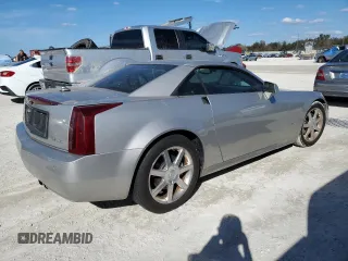 2005 Cadillac XLR z VIN 1G6YV34A455601742, wystawiony jako Copart lot #77878544 z przebiegiem Nie podano mil oraz Szkody całkowita. Historia ofert i sprzedaży dostępna na DreamBid. Obrazek 3.
