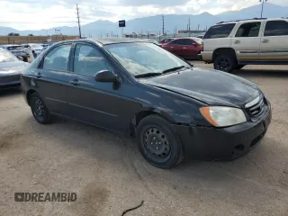 2006 Kia Spectra EX with VIN KNAFE121065348140, listed as a Copart auction lot 70874144 with 181,710 mi miles and Salvage Title. Bid and sale history available at carsss.com. Image 4.