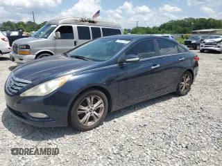 2013 Hyundai Sonata SE z VIN 5NPEC4AC7DH666360, wystawiony jako Copart lot #57891885 z przebiegiem 153 002 mil mil oraz Czysty tytuł • Clean title. Historia ofert i sprzedaży dostępna na DreamBid. Obrazek 1.