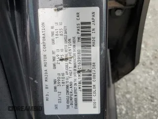 2012 Mazda 3 i Grand Touring с VIN JM1BL1M75C1639180, выставлен на аукционе Copart как лот 57331105 с пробегом 98 176 миль миль и Списание • Salvage title. История ставок и продаж доступна на DreamBid. Изображение 12.