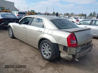 2006 Chrysler 300 C with VIN 2C3KA63HX6H487887, listed as a IAAI auction lot 41603068 with 133,169 mi miles. Bid and sale history available at carsss.com. Image 3.