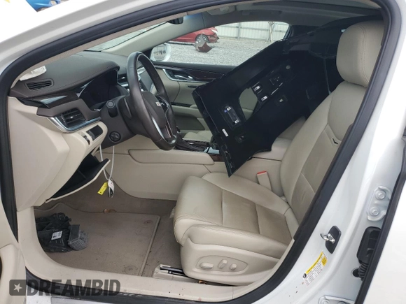 2016 Cadillac XTS Luxury Collection with VIN 2G61M5S34G9209483, listed as a Copart auction lot 54611105 with 23,778 mi miles and Salvage title. Bid and sale history available at DreamBid. Image 7.