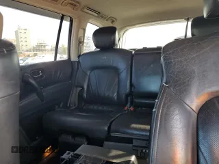 2012 Infiniti QX56 8-passenger with VIN JN8AZ2ND7C9715587, listed as a Copart auction lot 64508345 with 217,786 mi miles and Salvage title. Bid and sale history available at DreamBid. Image 10.