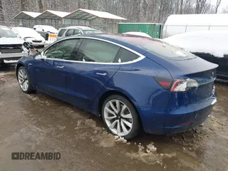 2018 Tesla Model 3 Long Range Battery z VIN 5YJ3E1EA5JF006370, wystawiony jako IAAI lot #41565266 z przebiegiem 55 376 mil mil oraz . Historia ofert i sprzedaży dostępna na DreamBid. Obrazek 3.
