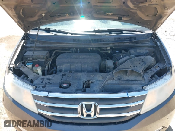 2012 Honda Odyssey Touring with VIN 5FNRL5H93CB109394, listed as a IAAI auction lot 42280018 with 190,412 mi miles and . Bid and sale history available at DreamBid. Image 10.