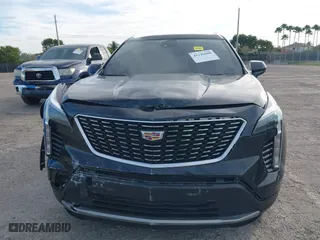 2020 Cadillac XT4 FWD Premium Luxury with VIN 1GYFZCR44LF070832, listed as a IAAI auction lot 41249608 with 77,471 mi miles. Bid and sale history available at carsss.com. Image 6.