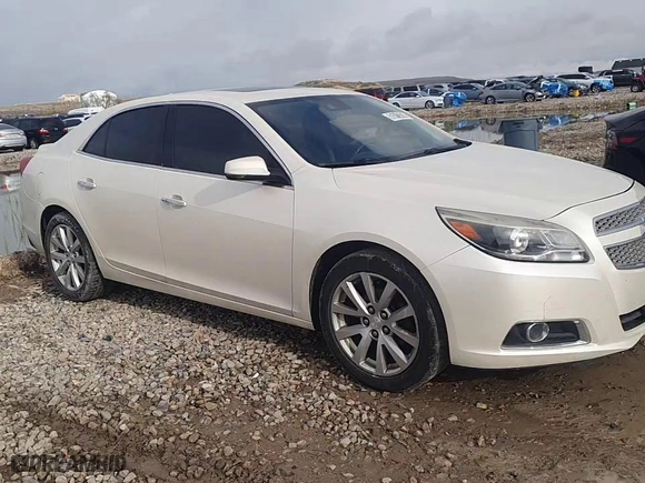 2013 Chevrolet Malibu LTZ with VIN 1G11H5SA5DF129394, listed as a Copart auction lot 51552605 with 136,982 mi miles and Salvage Title. Bid and sale history available at carsss.com. Image 11.