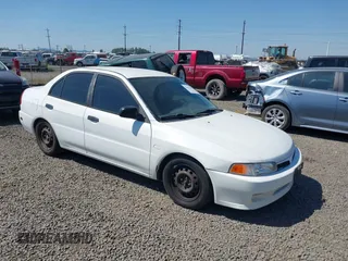 2000 Mitsubishi Mirage DE z VIN JA3AY26C4YU017932, wystawiony jako IAAI lot #42431603 z przebiegiem 193 139 mil mil oraz . Historia ofert i sprzedaży dostępna na DreamBid. Obrazek 1.