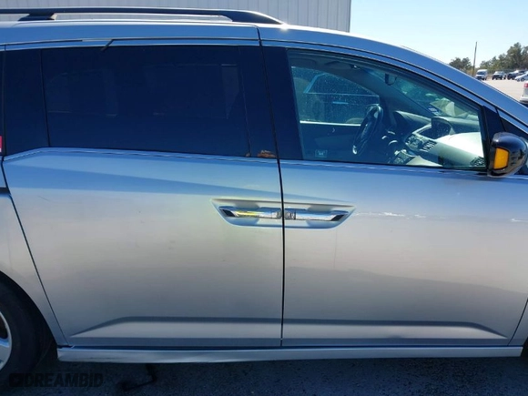 2012 Honda Odyssey Touring with VIN 5FNRL5H9XCB095283, listed as a IAAI auction lot 41479598 with NaN miles. Bid and sale history available at carsss.com. Image 14.