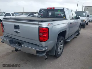 2014 Chevrolet Silverado 1500 LTZ with VIN 3GCUKSEC9EG228849, listed as a IAAI auction lot 41940320 with 165,630 mi miles. Bid and sale history available at carsss.com. Image 4.