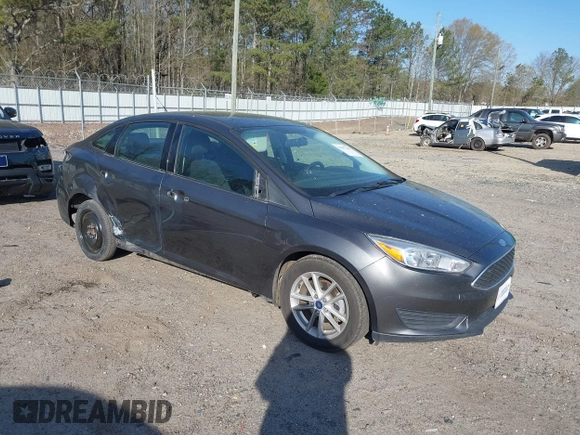 2018 Ford Focus SE with VIN 1FADP3F27JL294865, listed as a IAAI auction lot 41897496 with 100,048 mi miles and . Bid and sale history available at carsss.com. Image 1.