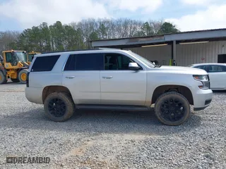2016 Chevrolet Tahoe LS with VIN 1GNSCAKC5GR354722, listed as a IAAI auction lot 41812839 with 146,533 mi miles. Bid and sale history available at carsss.com. Image 13.