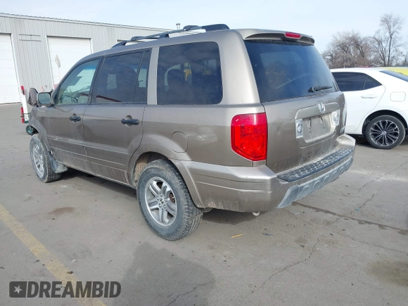 2005 Honda Pilot EX-L z VIN 2HKYF18665H523484, wystawiony jako IAAI lot #41697429 z przebiegiem 294 241 mil mil oraz . Historia ofert i sprzedaży dostępna na DreamBid. Obrazek 3.
