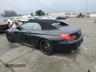 2014 BMW M6 z VIN WBSLZ9C50EDZ78599, wystawiony jako Copart lot #84724974 z przebiegiem 115 051 mil mil oraz Czysty tytuł • Clean title. Historia ofert i sprzedaży dostępna na DreamBid. Obrazek 2.