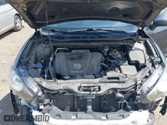 2015 Mazda CX-5 Touring with VIN JM3KE4CY9F0506879, listed as a IAAI auction lot 42209768 with 87,690 mi miles and . Bid and sale history available at DreamBid. Image 10.