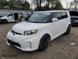 2014 Scion xB with VIN JTLZE4FE3EJ050898, listed as a Copart auction lot 52227715 with 69,629 mi miles and Salvage Title. Bid and sale history available at carsss.com. Image 1.
